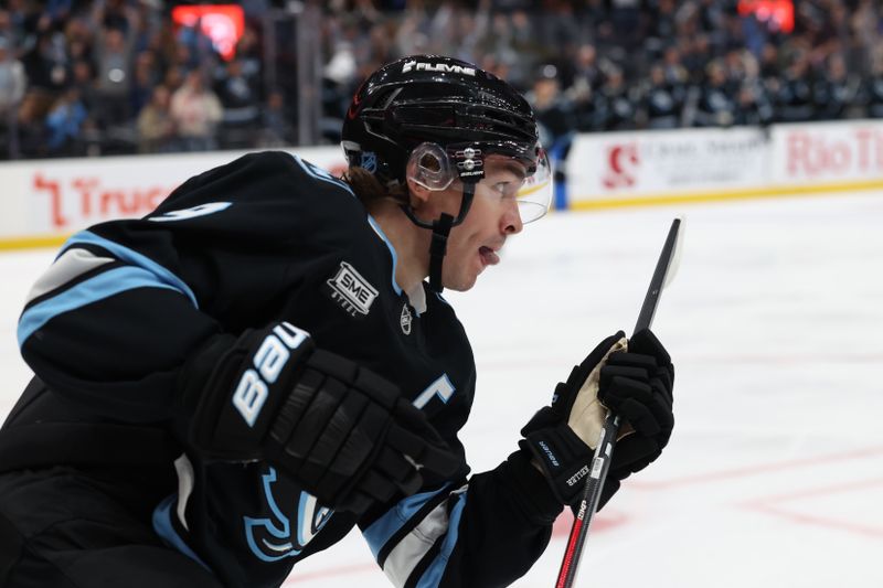 Feb 27, 2026; Salt Lake City, Utah, USA;Utah Mammoth right wing Clayton Keller (9) celebrates scoring a goal against the Minnesota Wild during the second period at Delta Center. Mandatory Credit: Rob Gray-Imagn Images