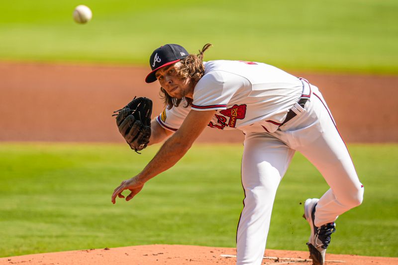 Oct 1, 2023; Cumberland, Georgia, USA; Atlanta Braves starting pitcher Dylan Dodd (46) pitches against the Washington Nationals during the first inning at Truist Park. Mandatory Credit: Dale Zanine-USA TODAY Sports