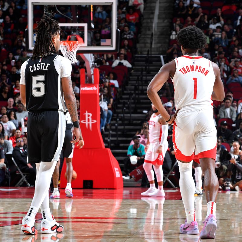 HOUSTON, TX - OCTOBER 17: Stephon Castle #5 of the San Antonio Spurs and Amen Thompson #1 of the Houston Rockets look on during the game on October 17, 2024 at the Toyota Center in Houston, Texas. NOTE TO USER: User expressly acknowledges and agrees that, by downloading and or using this photograph, User is consenting to the terms and conditions of the Getty Images License Agreement. Mandatory Copyright Notice: Copyright 2024 NBAE (Photo by Logan Riely/NBAE via Getty Images)