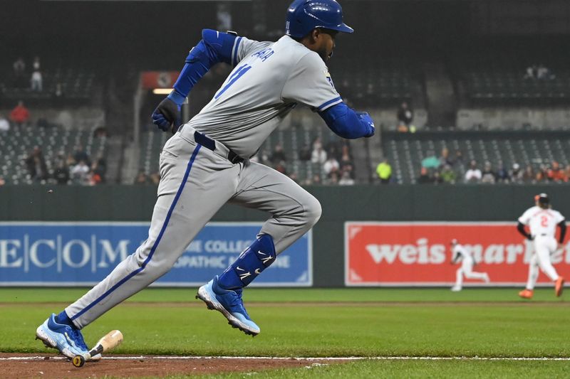 Apr 2, 2024; Baltimore, Maryland, USA; Kansas City Royals third baseman Maikel Garcia (11) runs out a second inning rbi double against the Baltimore Orioles  at Oriole Park at Camden Yards. Mandatory Credit: Tommy Gilligan-USA TODAY Sports