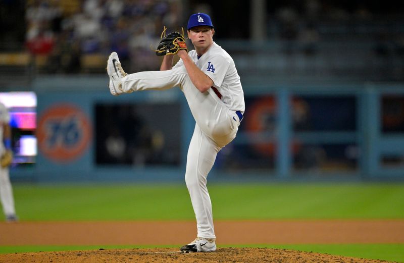 Aug 16, 2023; Los Angeles, California, USA;  Los Angeles Dodgers relief pitcher Gus Varland (58) threw a scoreless 8th and 9th inning against the Milwaukee Brewers at Dodger Stadium. Mandatory Credit: Jayne Kamin-Oncea-USA TODAY Sports