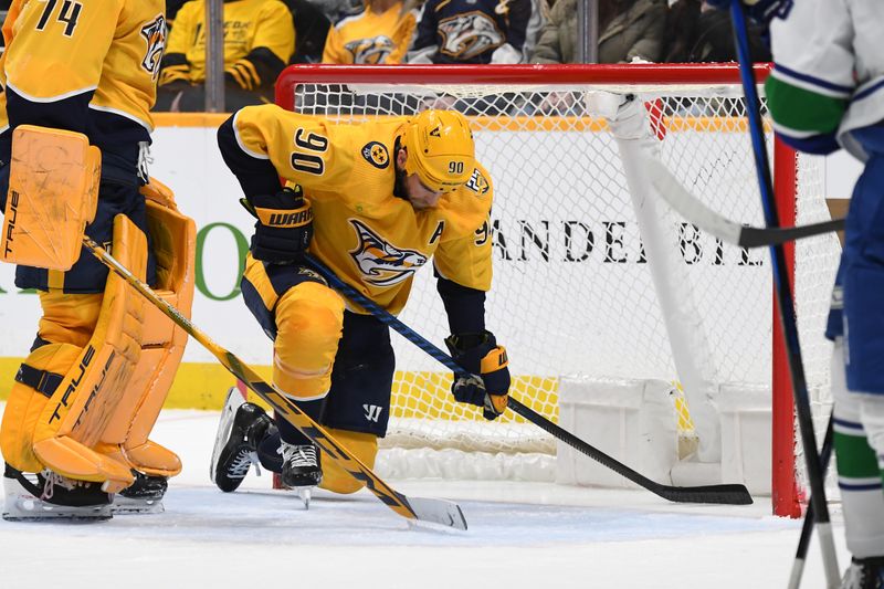 Dec 19, 2023; Nashville, Tennessee, USA; Nashville Predators center Ryan O'Reilly (90) reacts after a goal by the Vancouver Canucks during the second period at Bridgestone Arena. Mandatory Credit: Christopher Hanewinckel-USA TODAY Sports