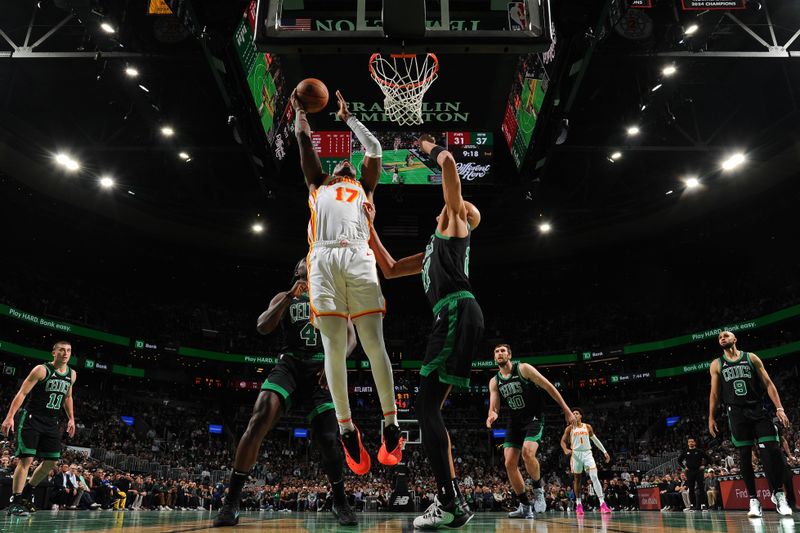 BOSTON, MA - NOVEMBER 12: Onyeka Okongwu #17 of the Atlanta Hawks dunks the ball during the game against the Boston Celtics during the Emirates NBA Cup game on November 12, 2024 at TD Garden in Boston, Massachusetts. NOTE TO USER: User expressly acknowledges and agrees that, by downloading and/or using this Photograph, user is consenting to the terms and conditions of the Getty Images License Agreement. Mandatory Copyright Notice: Copyright 2024 NBAE (Photo by Brian Babineau/NBAE via Getty Images)