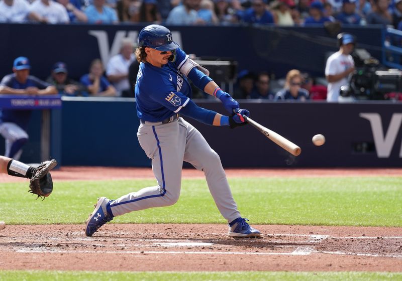 Sep 10, 2023; Toronto, Ontario, CAN; Kansas City Royals shortstop Bobby Witt Jr. (7) hits an RBI double against the Toronto Blue Jays during the sixth inning at Rogers Centre. Mandatory Credit: Nick Turchiaro-USA TODAY Sports