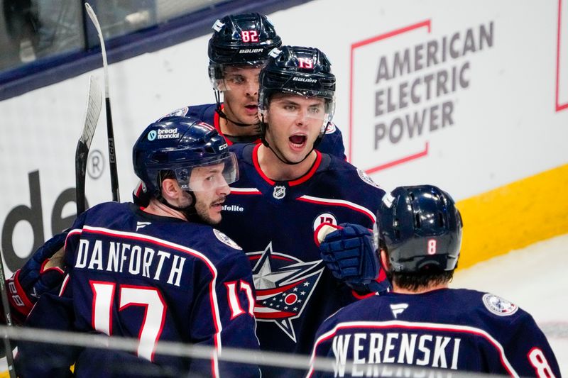 Oct 17, 2024; Columbus, Ohio, USA; Columbus Blue Jackets center Adam Fantilli (19) celebrates after scoring a goal in the second period at Nationwide Arena on Thursday.  Mandatory Credit: Samantha Madar/USA TODAY Network via Imagn Images