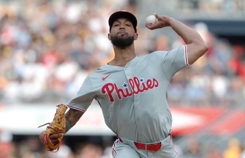 Jul 20, 2024; Pittsburgh, Pennsylvania, USA; Philadelphia Phillies starting pitcher Cristopher Sanchez (61) delivers against the Pittsburgh Pirates during the first inning at PNC Park. Mandatory Credit: Charles LeClaire-USA TODAY Sports