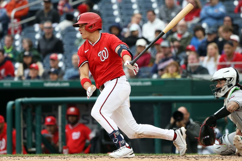 Apr 6, 2025; Washington, District of Columbia, USA; Washington Nationals outfielder Alex Call (17) hits a single during the fifth inning against the Arizona Diamondbacks at Nationals Park. Mandatory Credit: Daniel Kucin Jr.-Imagn Images