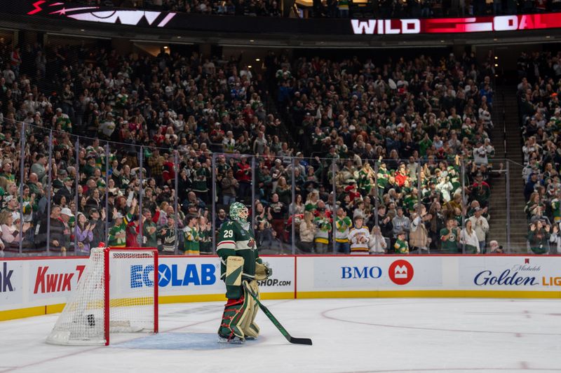 Oct 12, 2024; Saint Paul, Minnesota, USA; Minnesota Wild goaltender Marc-Andre Fleury (29) watches as his teammates score against the Seattle Kraken in the third period at Xcel Energy Center. Mandatory Credit: Matt Blewett-Imagn Images