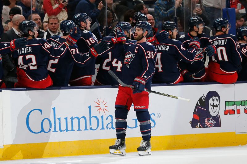 Mar 16, 2024; Columbus, Ohio, USA; Columbus Blue Jackets center Boone Jenner (38) celebrates his goal against the San Jose Sharks during the first period at Nationwide Arena. Mandatory Credit: Russell LaBounty-USA TODAY Sports