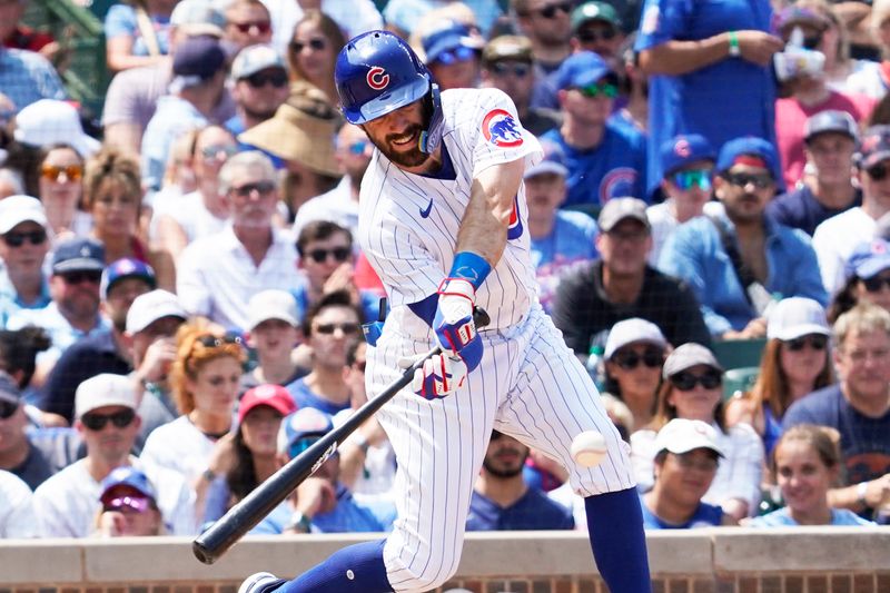 Jul 23, 2023; Chicago, Illinois, USA; Chicago Cubs shortstop Dansby Swanson (7) hits a single against the St. Louis Cardinals during the third inning at Wrigley Field. Mandatory Credit: David Banks-USA TODAY Sports