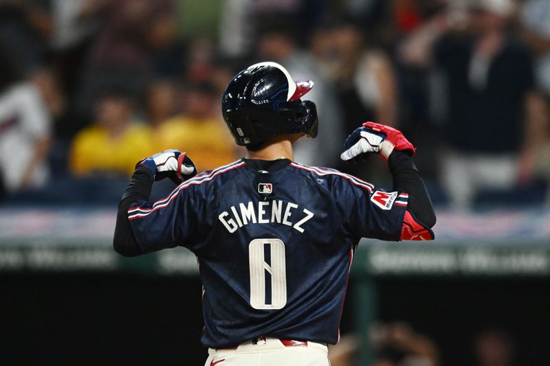 Aug 30, 2024; Cleveland, Ohio, USA; Cleveland Guardians second baseman Andres Gimenez (0) celebrates after hitting a home run during the fifth inning against the Pittsburgh Pirates at Progressive Field. Mandatory Credit: Ken Blaze-USA TODAY Sports