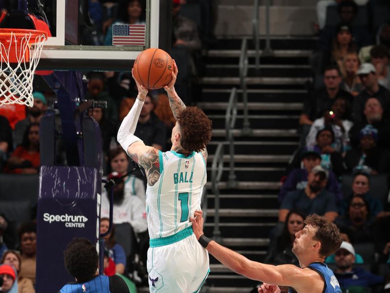 CHARLOTTE, NC - NOVEMBER 25: LaMelo Ball #1 of the Charlotte Hornets drives to the basket during the game against the Orlando Magic  during a regular season game on November 25, 2024 at Spectrum Center in Charlotte, North Carolina. NOTE TO USER: User expressly acknowledges and agrees that, by downloading and or using this photograph, User is consenting to the terms and conditions of the Getty Images License Agreement. Mandatory Copyright Notice: Copyright 2024 NBAE (Photo by Kent Smith/NBAE via Getty Images)