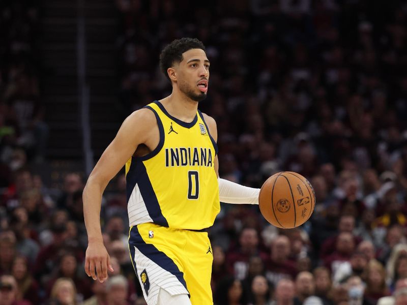 CLEVELAND, OH - MAY 4: Tyrese Haliburton #0 of the Indiana Pacers dribbles the ball during the game against the Cleveland Cavaliers during Round 2 Game 1 of the 2025 NBA Playoffs on May 4, 2025 at Rocket Mortgage FieldHouse in Cleveland, Ohio. NOTE TO USER: User expressly acknowledges and agrees that, by downloading and/or using this Photograph, user is consenting to the terms and conditions of the Getty Images License Agreement. Mandatory Copyright Notice: Copyright 2025 NBAE (Photo by  Lauren Leigh Bacho/NBAE via Getty Images)