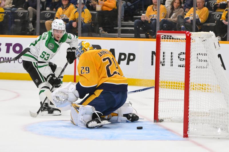 Oct 26, 2025; Nashville, Tennessee, USA;  Dallas Stars center Wyatt Johnston (53) scores past Nashville Predators goaltender Justus Annunen (29) during the second period at Bridgestone Arena. Mandatory Credit: Steve Roberts-Imagn Images