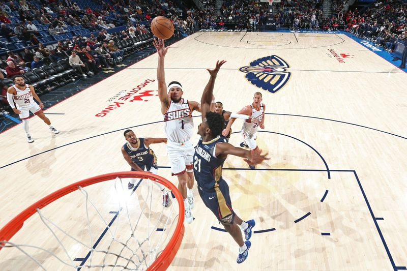 NEW ORLEANS, LA - DECEMBER 5: Devin Booker #1 of the Phoenix Suns drives to the basket during the game against the New Orleans Pelicans on December 5, 2024 at the Smoothie King Center in New Orleans, Louisiana. NOTE TO USER: User expressly acknowledges and agrees that, by downloading and or using this Photograph, user is consenting to the terms and conditions of the Getty Images License Agreement. Mandatory Copyright Notice: Copyright 2024 NBAE (Photo by Layne Murdoch Jr./NBAE via Getty Images)