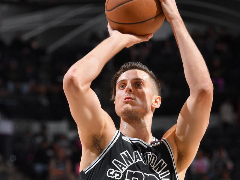 SAN ANTONIO, TX - MARCH 14: Zach Collins #23 of the San Antonio Spurs shoots a free throw during the game against the Orlando Magic on March 14, 2023 at the AT&T Center in San Antonio, Texas. NOTE TO USER: User expressly acknowledges and agrees that, by downloading and or using this photograph, user is consenting to the terms and conditions of the Getty Images License Agreement. Mandatory Copyright Notice: Copyright 2023 NBAE (Photos by Michael Gonzales/NBAE via Getty Images)