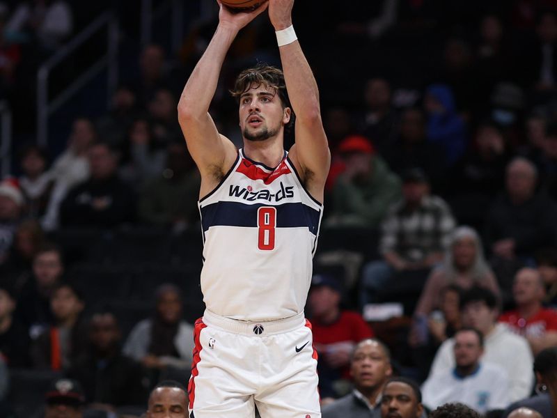 WASHINGTON, DC - DECEMBER 13: Deni Avdija #8 of the Washington Wizards shoots against the New Orleans Pelicans during the first half at Capital One Arena on December 13, 2023 in Washington, DC. NOTE TO USER: User expressly acknowledges and agrees that, by downloading and or using this photograph, User is consenting to the terms and conditions of the Getty Images License Agreement. (Photo by Patrick Smith/Getty Images)