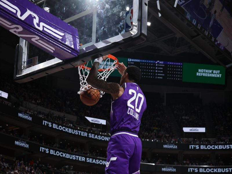 SALT LAKE CITY, UT - MARCH 25: John Collins #20 of the Utah Jazz dunks the ball during the game against the Dallas Mavericks on March 25, 2024 at Delta Center in Salt Lake City, Utah. NOTE TO USER: User expressly acknowledges and agrees that, by downloading and or using this Photograph, User is consenting to the terms and conditions of the Getty Images License Agreement. Mandatory Copyright Notice: Copyright 2024 NBAE (Photo by Melissa Majchrzak/NBAE via Getty Images)