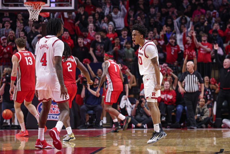 Jan 2, 2026; Piscataway, New Jersey, USA; Rutgers Scarlet Knights guard Tariq Francis (0) reacts after a basket against the Ohio State Buckeyes during the first half at Jersey Mike's Arena. Mandatory Credit: Vincent Carchietta-Imagn Images