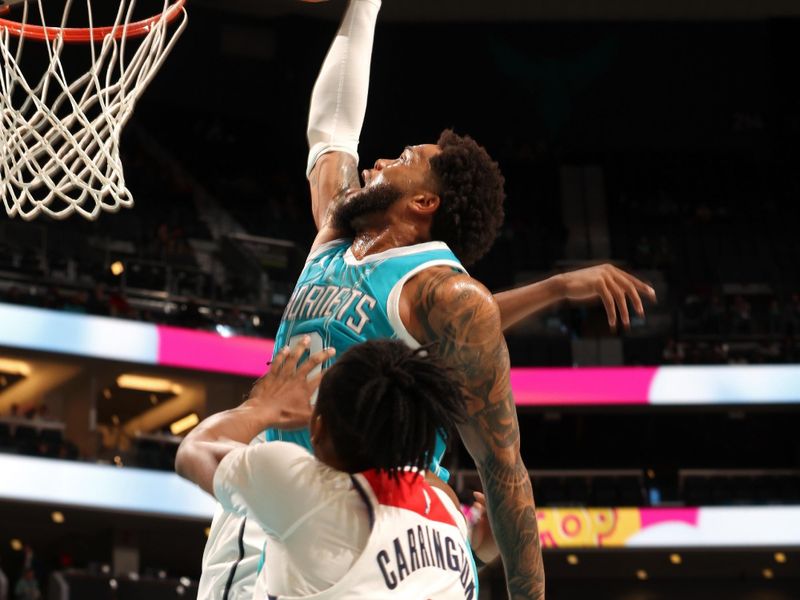 CHARLOTTE, NC - FEBRUARY 3: Miles Bridges #0 of the Charlotte Hornets dunks the ball during the game against the Washington Wizards on February 3, 2025 at Spectrum Center in Charlotte, North Carolina. NOTE TO USER: User expressly acknowledges and agrees that, by downloading and or using this photograph, User is consenting to the terms and conditions of the Getty Images License Agreement. Mandatory Copyright Notice: Copyright 2025 NBAE(Photo by Kent Smith/NBAE via Getty Images)