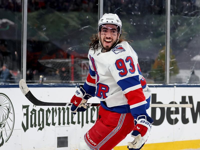 Feb 18, 2024; East Rutherford, New Jersey, USA; New York Rangers center Mika Zibanejad (93) reacts after his game tying power play goal against the New York Islanders during the third period of a Stadium Series ice hockey game at MetLife Stadium. Mandatory Credit: Brad Penner-USA TODAY Sports