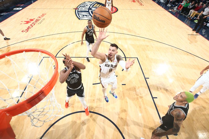 NEW ORLEANS, LA - DECEMBER 22: Willy Hernangomez #9 of the New Orleans Pelicans shoots the ball during the game against the San Antonio Spurs on December 22, 2022 at the Smoothie King Center in New Orleans, Louisiana. NOTE TO USER: User expressly acknowledges and agrees that, by downloading and or using this Photograph, user is consenting to the terms and conditions of the Getty Images License Agreement. Mandatory Copyright Notice: Copyright 2022 NBAE (Photo by Ned Dishman/NBAE via Getty Images)