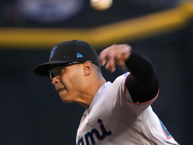 May 9, 2023; Phoenix, Arizona, USA; Miami Marlins starting pitcher Jesus Luzardo (44) pitches against the Arizona Diamondbacks during the first inning at Chase Field. Mandatory Credit: Joe Camporeale-USA TODAY Sports