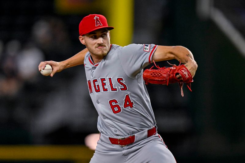 Sep 5, 2024; Arlington, Texas, USA; Los Angeles Angels starting pitcher Jack Kochanowicz (64) pitches against the Texas Rangers during the first inning at Globe Life Field. Mandatory Credit: Jerome Miron-Imagn Images