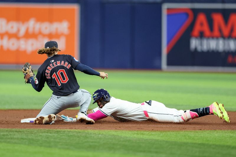 Jul 12, 2024; St. Petersburg, Florida, USA; Tampa Bay Rays first baseman Yandy Diaz (2) slides into second base after hitting a rbi double against the Cleveland Guardians in the fifth inning at Tropicana Field. Mandatory Credit: Nathan Ray Seebeck-USA TODAY Sports