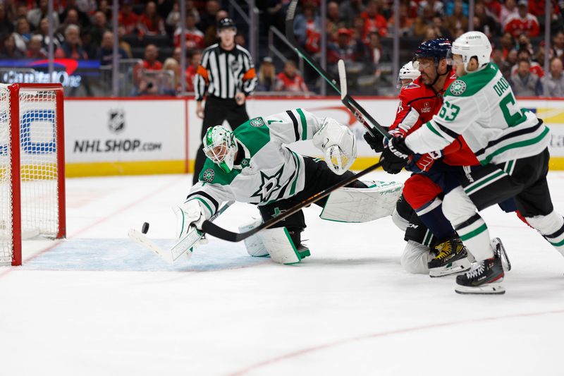 Oct 17, 2024; Washington, District of Columbia, USA; Washington Capitals left wing Alex Ovechkin (8) and Dallas Stars right wing Evgenii Dadonov (63) battles for the puck in front of Stars goaltender Casey DeSmith (1) in the third period at Capital One Arena. Mandatory Credit: Geoff Burke-Imagn Images