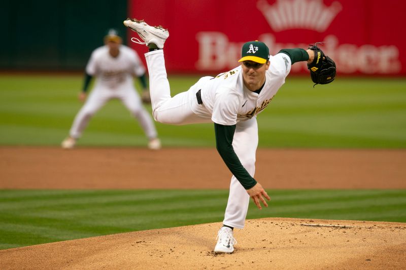 May 24, 2024; Oakland, California, USA; Oakland Athletics starting pitcher Ross Stripling (36) delivers a pitch against the Houston Astros during the first inning at Oakland-Alameda County Coliseum. Mandatory Credit: D. Ross Cameron-USA TODAY Sports