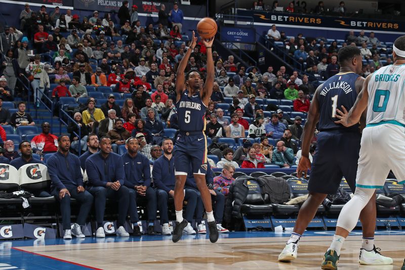 NEW ORLEANS, LA - JANUARY 17: Herb Jones #5 of the New Orleans Pelicans shoots a three point basket during the game against the Charlotte Hornets on January 17, 2024 at the Smoothie King Center in New Orleans, Louisiana. NOTE TO USER: User expressly acknowledges and agrees that, by downloading and or using this Photograph, user is consenting to the terms and conditions of the Getty Images License Agreement. Mandatory Copyright Notice: Copyright 2024 NBAE (Photo by Layne Murdoch Jr./NBAE via Getty Images)