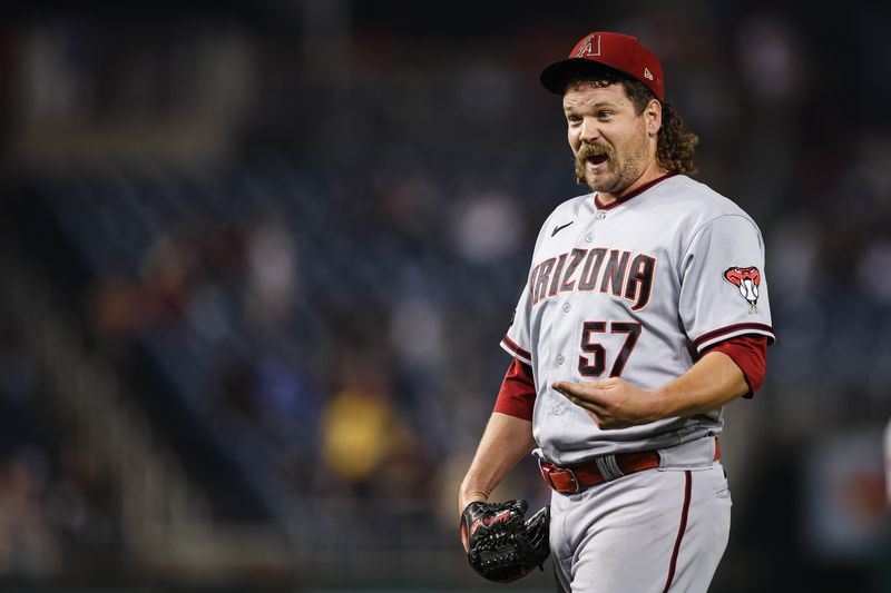 Jun 7, 2023; Washington, District of Columbia, USA; Arizona Diamondbacks relief pitcher Andrew Chafin (57) celebrates after the final out of the game against the Washington Nationals at Nationals Park. Mandatory Credit: Scott Taetsch-USA TODAY Sports