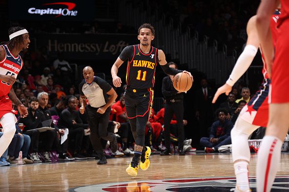 WASHINGTON, DC -? DECEMBER 31: Trae Young #11 of the Atlanta Hawks dribbles the ball during the game against the Washington Wizards on December 31, 2023 at Capital One Arena in Washington, DC. NOTE TO USER: User expressly acknowledges and agrees that, by downloading and or using this Photograph, user is consenting to the terms and conditions of the Getty Images License Agreement. Mandatory Copyright Notice: Copyright 2023 NBAE (Photo by Stephen Gosling/NBAE via Getty Images)