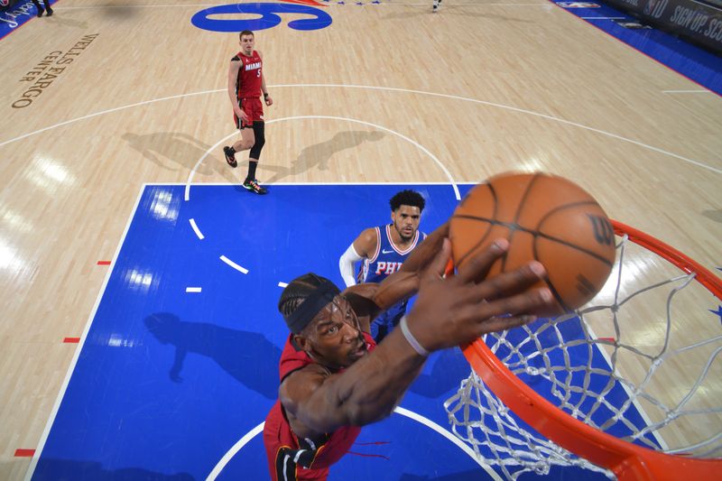 PHILADELPHIA, PA - APRIL 17: Jimmy Butler #22 of the Miami Heat dunks the ball during the game against the Philadelphia 76ers during the 2024 NBA Play-In Tournament on April 17, 2024 at the Wells Fargo Center in Philadelphia, Pennsylvania NOTE TO USER: User expressly acknowledges and agrees that, by downloading and/or using this Photograph, user is consenting to the terms and conditions of the Getty Images License Agreement. Mandatory Copyright Notice: Copyright 2024 NBAE (Photo by Jesse D. Garrabrant/NBAE via Getty Images)
