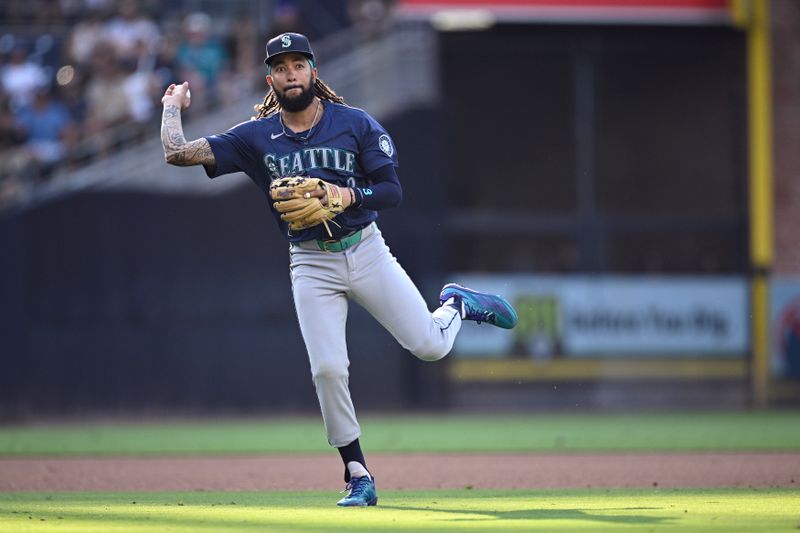 Jul 10, 2024; San Diego, California, USA; Seattle Mariners shortstop J.P. Crawford (3) throws to first base on a ground out by San Diego Padres third baseman Donovan Solano (not pictured) during the ninth inning at Petco Park. Mandatory Credit: Orlando Ramirez-USA TODAY Sports