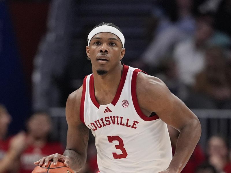 Mar 11, 2026; Charlotte, NC, USA; Louisville Cardinals guard Ryan Conwell (3) dribbles against the Southern Methodist University Mustangs during the first half at Spectrum Center. Mandatory Credit: Jim Dedmon-Imagn Images