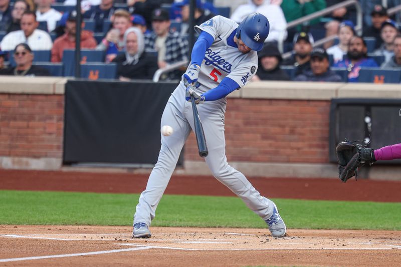 May 25, 2025; New York City, New York, USA; Los Angeles Dodgers first baseman Freddie Freeman (5) doubles  during the first inning against the New York Mets at Citi Field. Mandatory Credit: Vincent Carchietta-Imagn Images