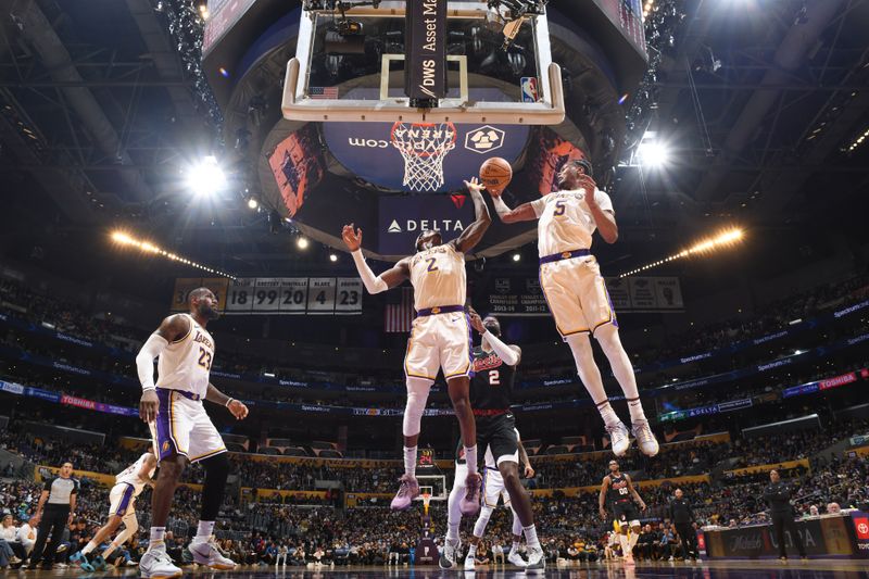 LOS ANGELES, CA - JANUARY 21: Cam Reddish #5 of the Los Angeles Lakers grabs the rebound during the game on January 21, 2024 at Crypto.Com Arena in Los Angeles, California. NOTE TO USER: User expressly acknowledges and agrees that, by downloading and/or using this Photograph, user is consenting to the terms and conditions of the Getty Images License Agreement. Mandatory Copyright Notice: Copyright 2024 NBAE (Photo by Juan Ocampo/NBAE via Getty Images)