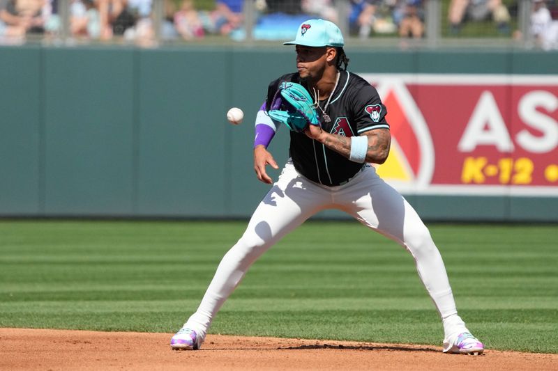 Mar 8, 2024; Salt River Pima-Maricopa, Arizona Diamondbacks second baseman Ketel Marte (4) makes the play for an out against the Chicago Cubs in the fourth inning at Salt River Fields at Talking Stick. Mandatory Credit: Rick Scuteri-USA TODAY Sports