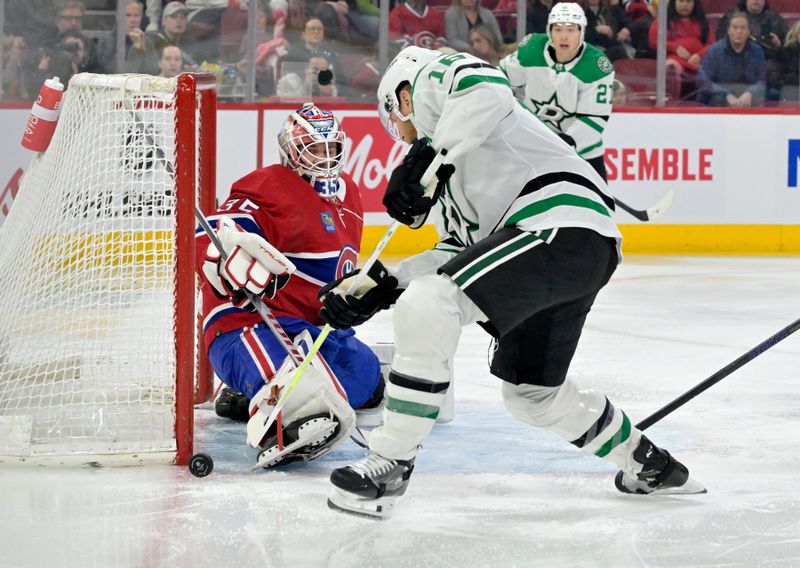 Feb 10, 2024; Montreal, Quebec, CAN; Montreal Canadiens goalie Sam Montembeault (35) makes a toe save against Dallas Stars forward Joe Pavelski (16) during the first period at the Bell Centre. Mandatory Credit: Eric Bolte-USA TODAY Sports