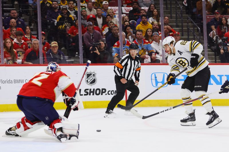 May 14, 2024; Sunrise, Florida, USA; Boston Bruins right wing David Pastrnak (88) shoots the puck against Florida Panthers goaltender Sergei Bobrovsky (72) during the first period in game five of the second round of the 2024 Stanley Cup Playoffs at Amerant Bank Arena. Mandatory Credit: Sam Navarro-USA TODAY Sports