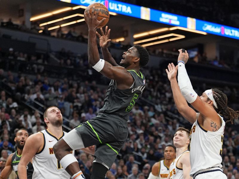 MINNEAPOLIS, MN - NOVEMBER 1: Anthony Edwards #5 of the Minnesota Timberwolves drives to the basket during the game against the Denver Nuggets on November 1, 2024 at Target Center in Minneapolis, Minnesota. NOTE TO USER: User expressly acknowledges and agrees that, by downloading and or using this Photograph, user is consenting to the terms and conditions of the Getty Images License Agreement. Mandatory Copyright Notice: Copyright 2024 NBAE (Photo by Jordan Johnson/NBAE via Getty Images)