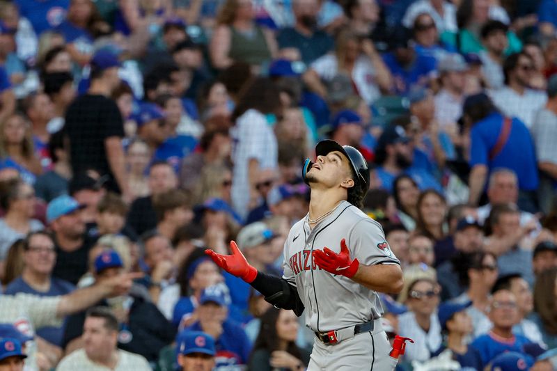 Jul 20, 2024; Chicago, Illinois, USA; Arizona Diamondbacks outfielder Alek Thomas (5) rounds the bases after hitting a solo home run against the Chicago Cubs during the fifth inning at Wrigley Field. Mandatory Credit: Kamil Krzaczynski-USA TODAY Sports