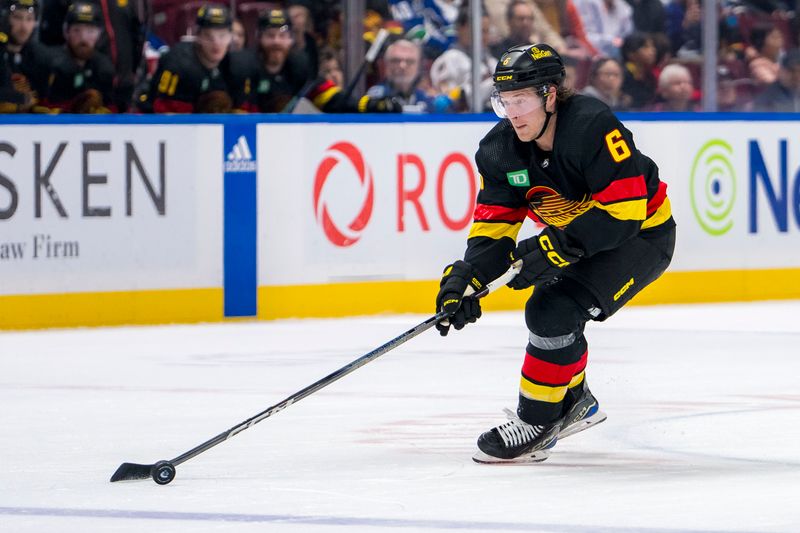 Mar 25, 2024; Vancouver, British Columbia, CAN;  Vancouver Canucks forward Brock Boeser (6) handles the puck against the Los Angeles Kings in the third period at Rogers Arena. Kings won 3 -2. Mandatory Credit: Bob Frid-USA TODAY Sports