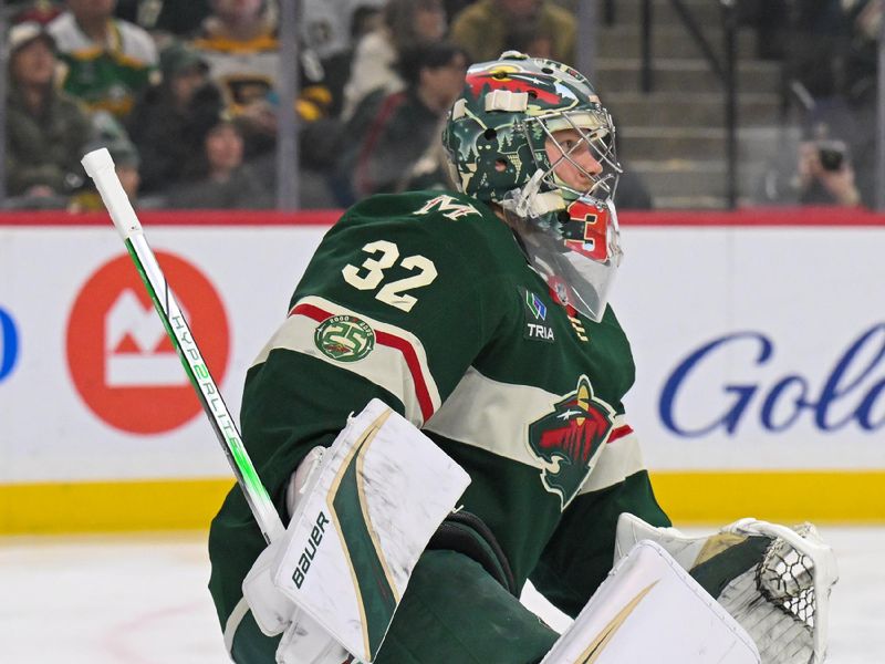 Dec 14, 2025; Saint Paul, Minnesota, USA; Minnesota Wild goalie Filip Gustavsson (32) defends the net against the Boston Bruins during the first period at Grand Casino Arena. Mandatory Credit: Nick Wosika-Imagn Images