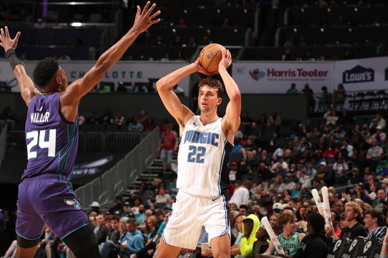 CHARLOTTE, NC - MARCH 5: Franz Wagner #22 of the Orlando Magic looks to pass the ball during the game against the Charlotte Hornets on March 5, 2024 at Spectrum Center in Charlotte, North Carolina. NOTE TO USER: User expressly acknowledges and agrees that, by downloading and or using this photograph, User is consenting to the terms and conditions of the Getty Images License Agreement. Mandatory Copyright Notice: Copyright 2024 NBAE (Photo by Kent Smith/NBAE via Getty Images)