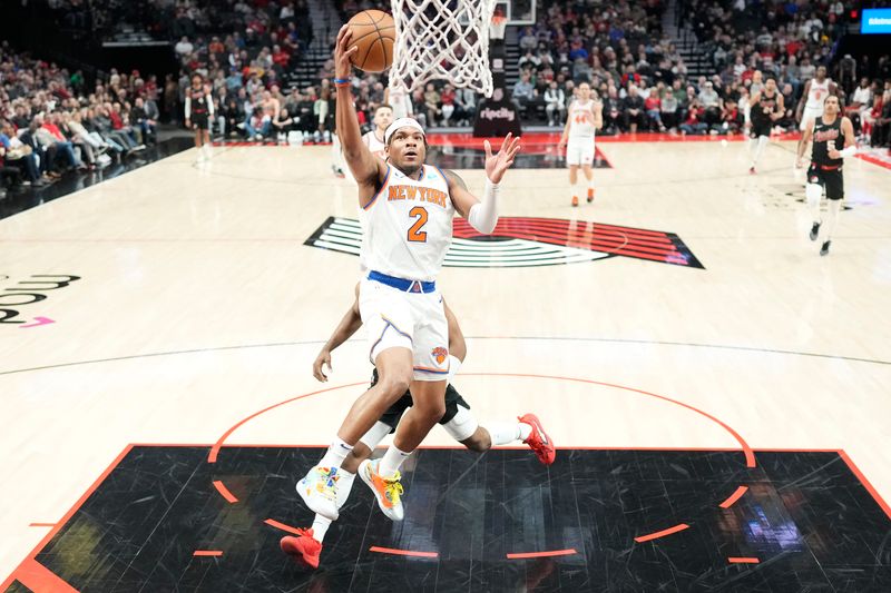 PORTLAND, OREGON - MARCH 14: Miles McBride #2 of the New York Knicks shoots the ball during the second half against the Portland Trail Blazers at Moda Center on March 14, 2024 in Portland, Oregon. NOTE TO USER: User expressly acknowledges and agrees that, by downloading and or using this photograph, User is consenting to the terms and conditions of the Getty Images License Agreement.  (Photo by Soobum Im/Getty Images)