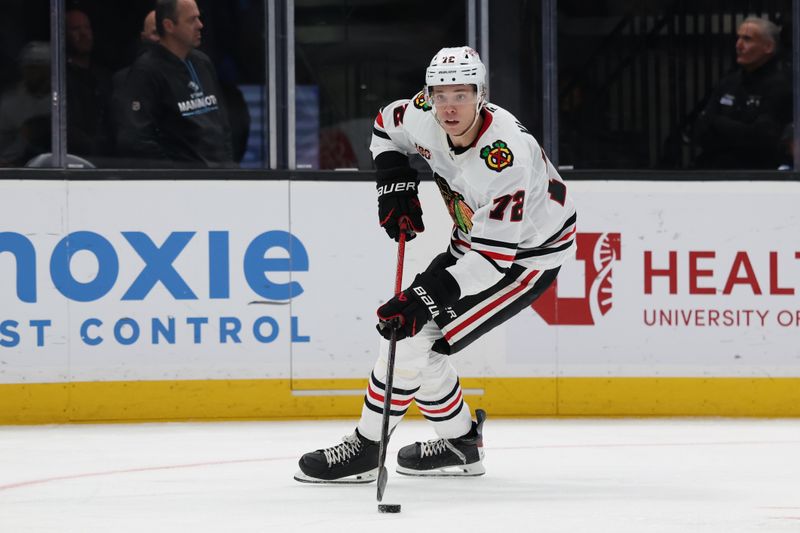 Mar 12, 2026; Salt Lake City, Utah, USA; Chicago Blackhawks defenseman Alex Vlasic (72) skates with the puck against the Utah Mammoth during the second period at Delta Center. Mandatory Credit: Rob Gray-Imagn Images