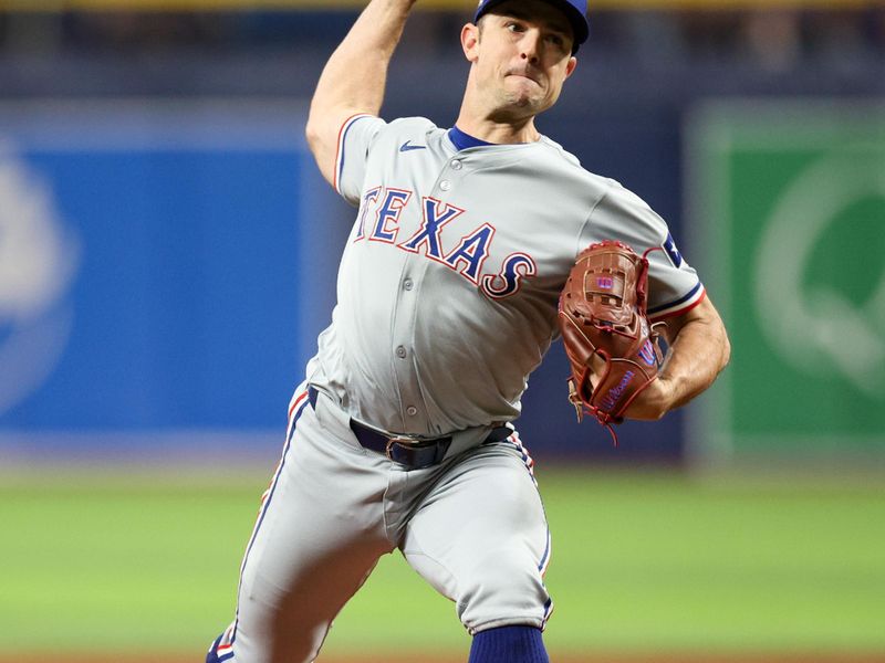 Apr 3, 2024; St. Petersburg, Florida, USA;  Texas Rangers relief pitcher David Robertson (37) throws a pitch against the Tampa Bay Rays in the eighth inning at Tropicana Field. Mandatory Credit: Nathan Ray Seebeck-USA TODAY Sports